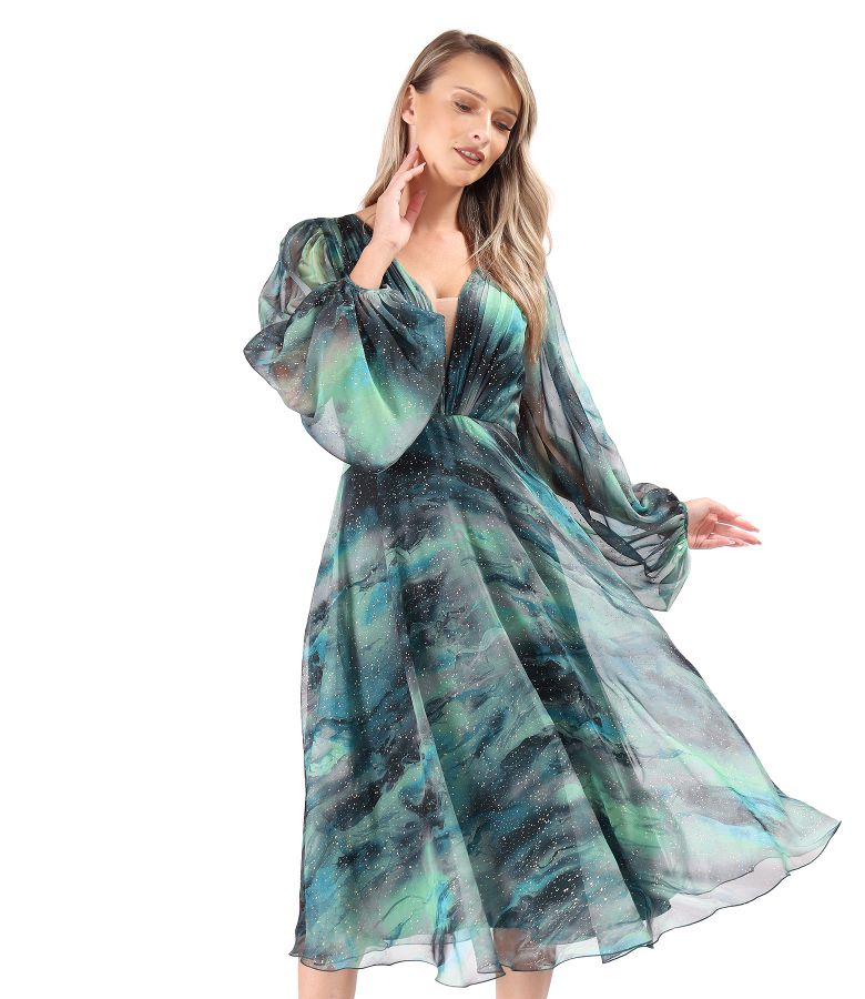 Elegant dress made of printed veil with golden motifs