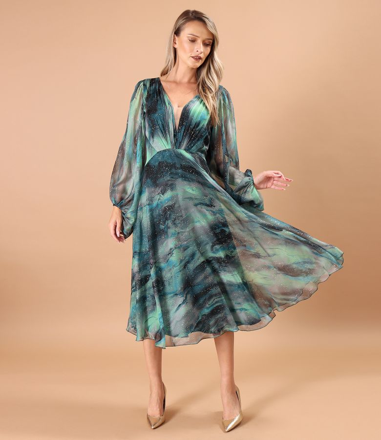 Elegant dress made of printed veil with golden motifs