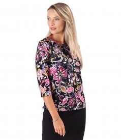 Elastic jersey blouse printed with floral motifs