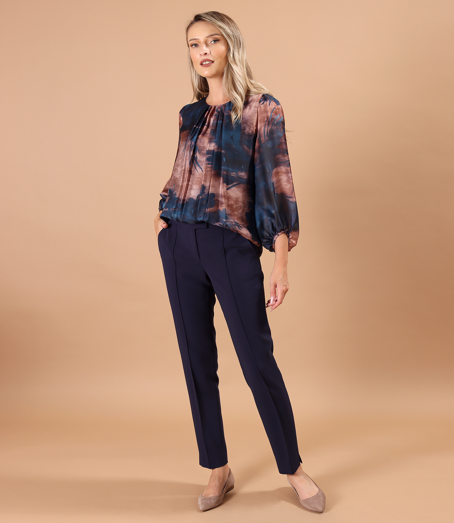 Elegant outfit with ankle pants and printed veil blouse