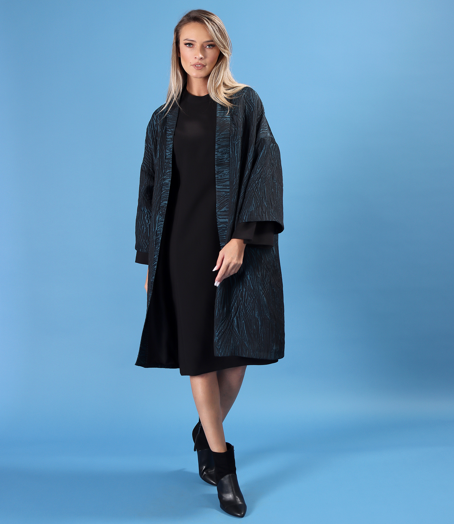 Oversized brocade jacket with black dress