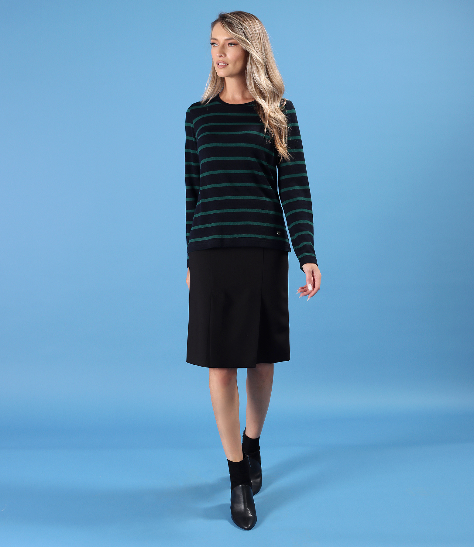 Elegant outfit featuring a flared skirt and blouse made of jersey and wool