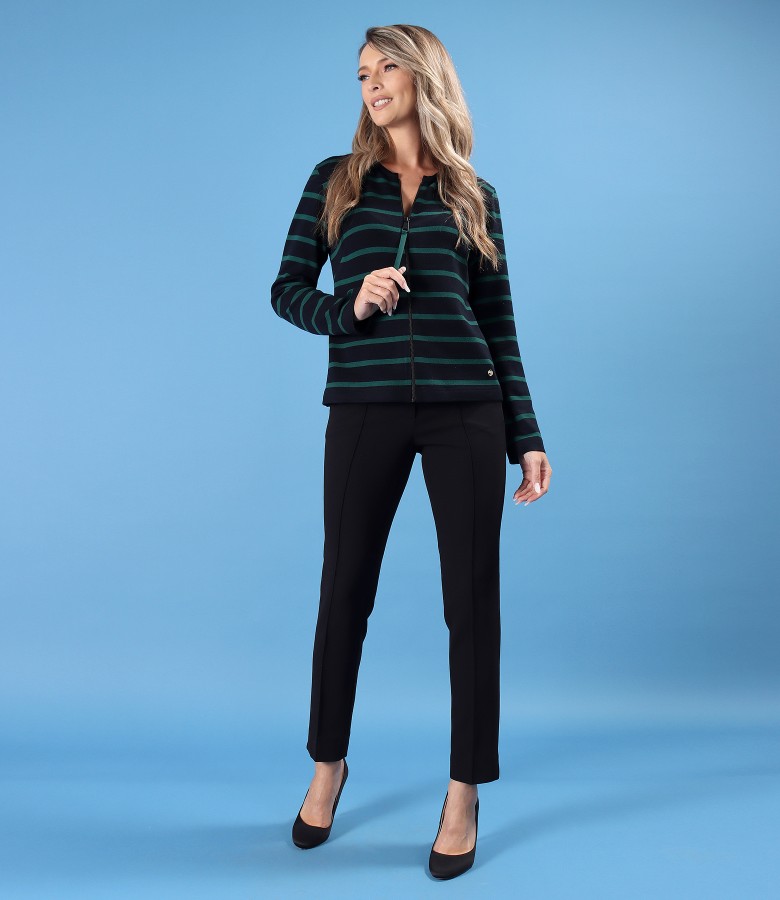 Casual outfit featuring a striped blouse and ankle pants